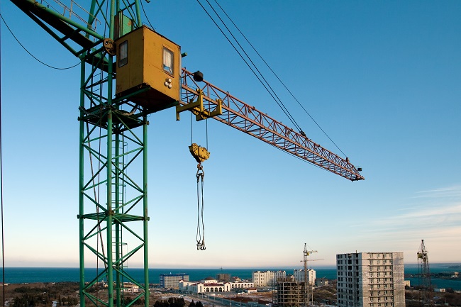 Construction crane over city